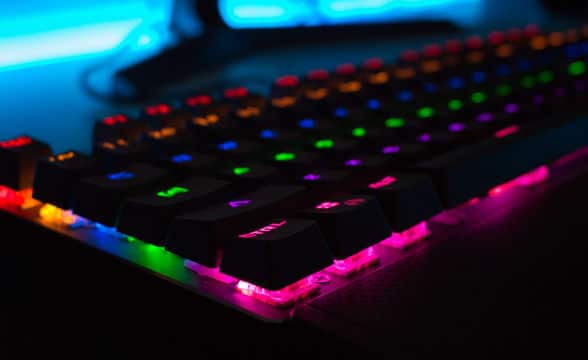 a-gaming-keyboard-with-multiple-neon-lights-in-the-dark