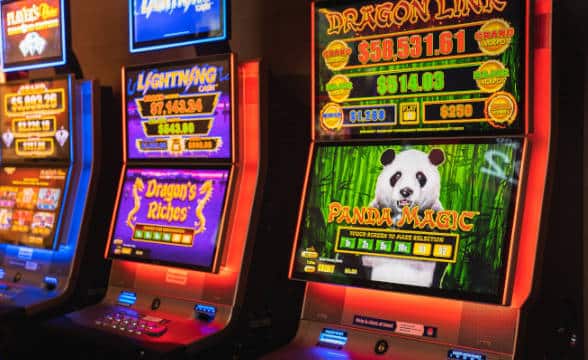 Cabinet slots in a land-based casino, most likely by Aristocrat Australian slot manufacturer.