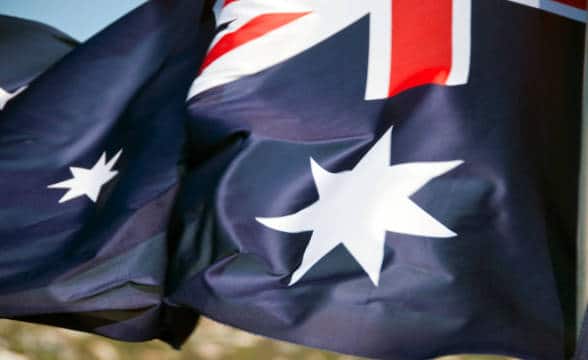 The Australian national flag flying in the air.