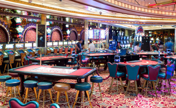 A gaming floor with casino tables.