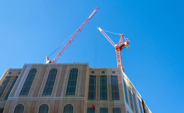 Casino resort building under construction with cranes