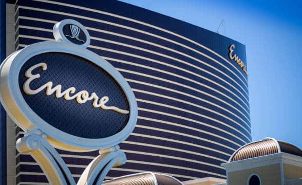 Encore Boston Harbor Casino seen from outside with the Encore sign in focus.