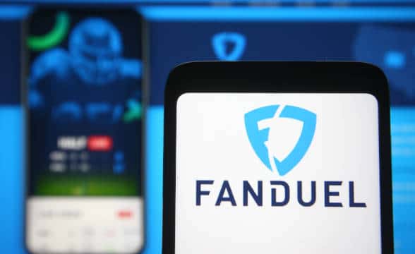 The FanDuel sports website loaded on both a computer and a smartphone.