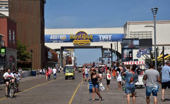 People walking around Atlantic City near the Hard Rock Casino.