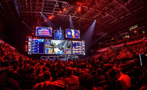 A live venue where an esports event is held with the stadium packed-full of fans.