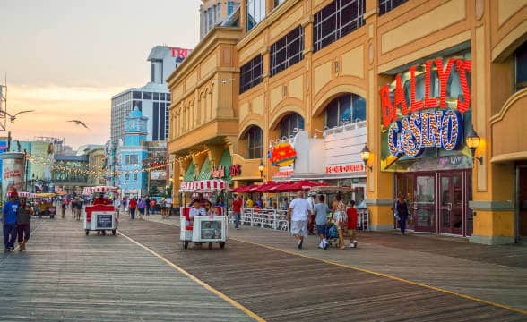 The broadwalk outside of the Bally's Casino in New Jersey in the sunset.