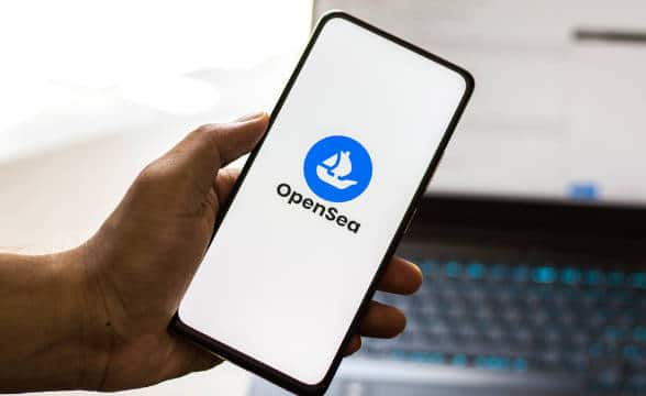 OpenSea platform's logo on a smartphone.