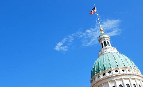 St Louis' Missouri Capitol with the US flag flying.