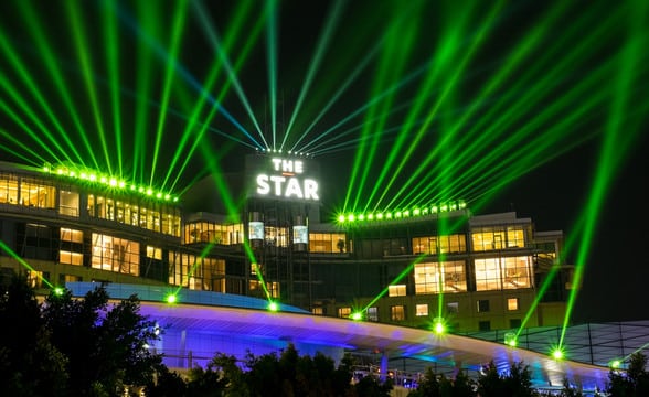 The Star City Casino in Australia lit up in green colours during some light-show performance.