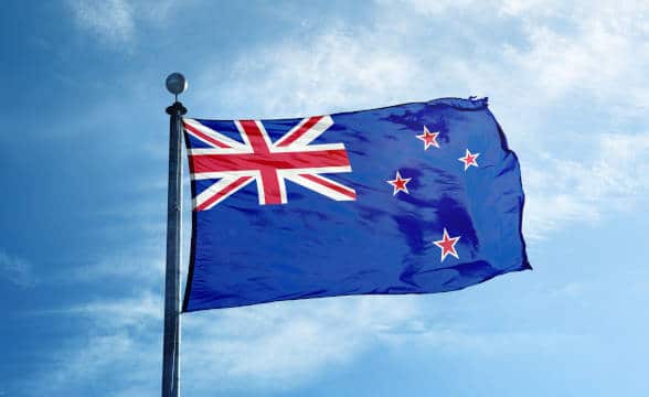 The New Zealand national flag flying in the air.