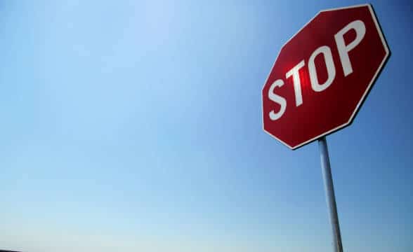 A road sign that says stop.