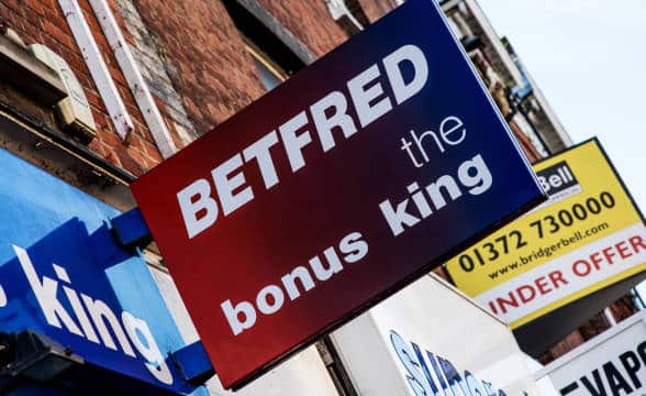 A Betfred sign outside a point of sale.