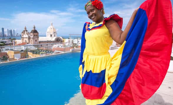 A woman in national Colombian outfit in Cartagena de Indias.