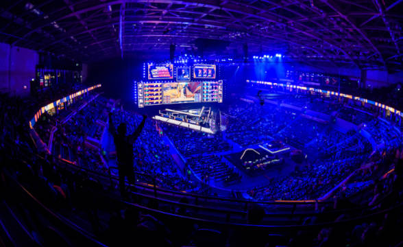 Esports arena with a live audience in attendance of an esports tournament.