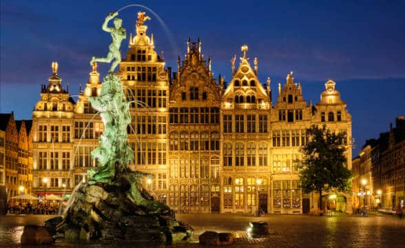 The Grote Market square in Belgium with the famous fountain sculpture.