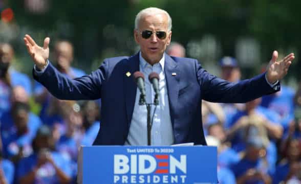 Joe Biden giving a speech at a political rally during his political campaign.