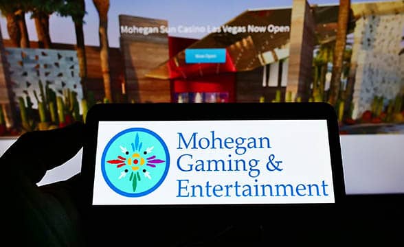 Mohegan Gaming & Entertainment's logo appears on a mobile device