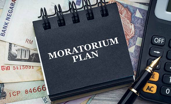 A moratorium plan sits on a desk