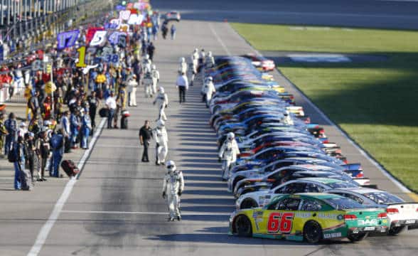 NASCAR Kansas Speedway with racers at the raceway.