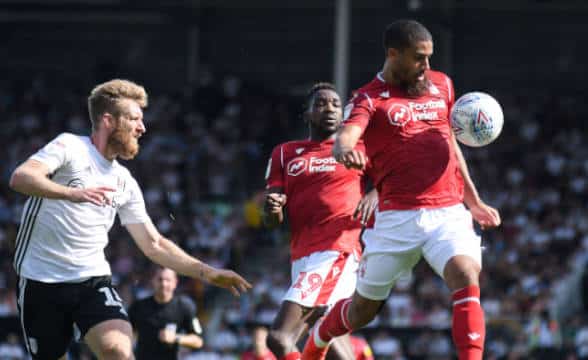 Nottingham FC soccer player caught in a game.