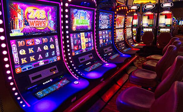 A row of slot machines in a casino