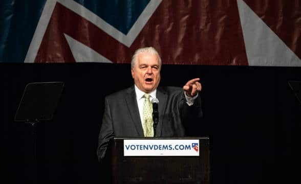 Steve Sisolak speaking at a Democratic Party convention.