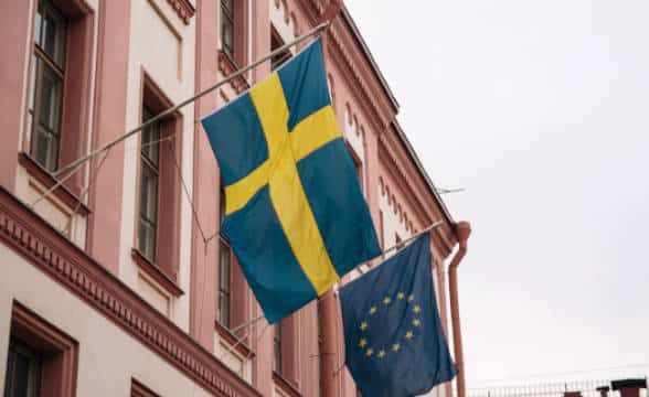 Sweden and national flag on a building.