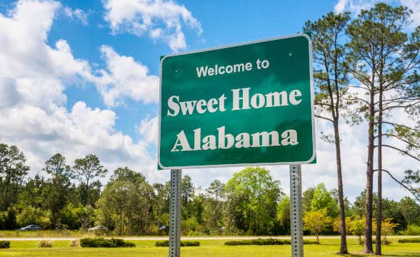 A sweet home Alabama state entry sign.