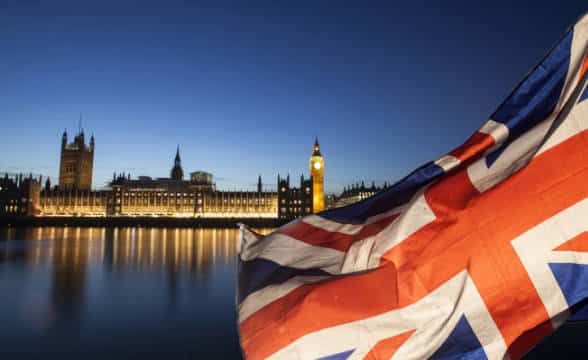 The British flag shot from the waterfront overlooking Big Ben.