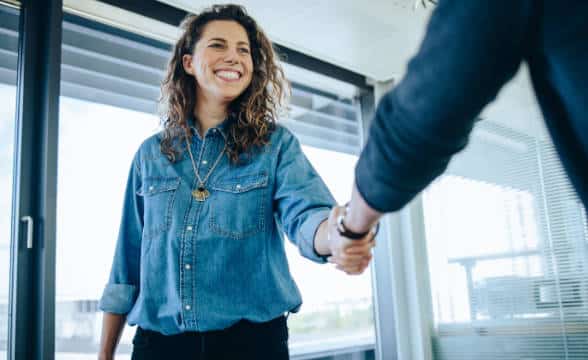 A woman being hired in a company.