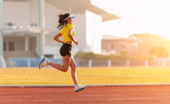 Athlete running in the track.