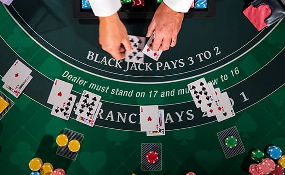 A dealer on a Blackjack table