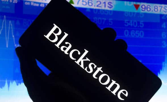 Blackstone Grou['s logo loaded on a smartphone.