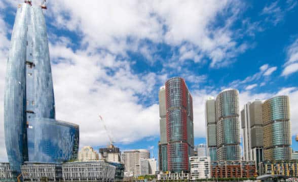 Crown Sydney Casino Resort during the day with the tower rising into the skies.