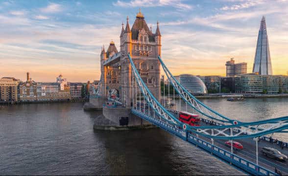 London Bridge in the morning with some traffic on.