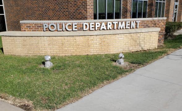 A police department welcome sign.