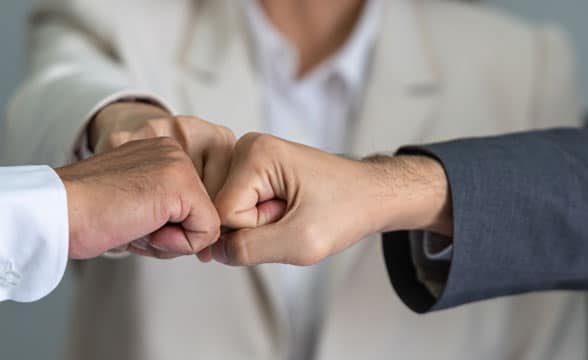 Three-way agreement fist bumping