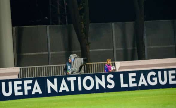 UEFA Nations League signage on stadiums.