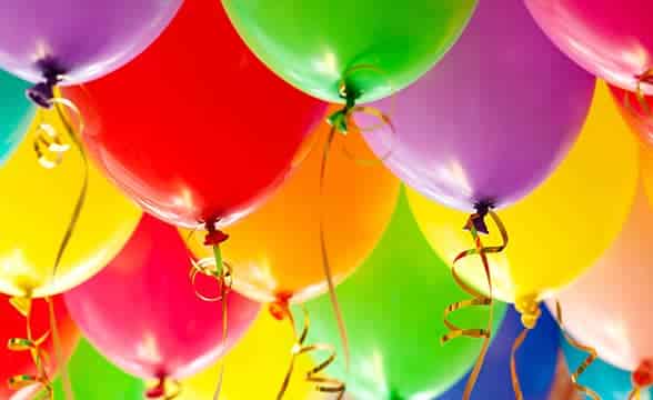 Many colorful balloons in the air