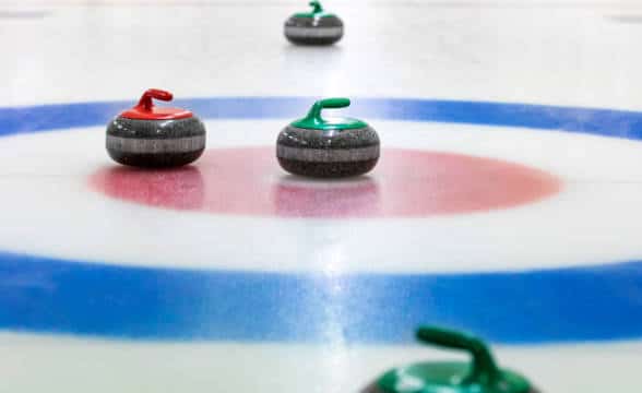 Curling paraphernalia on an official playing field.