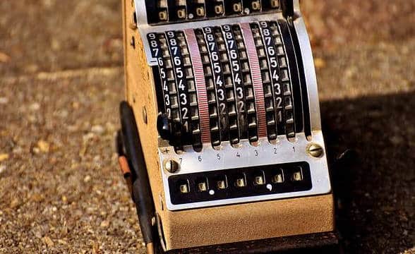 A calculating machine on the pavement.