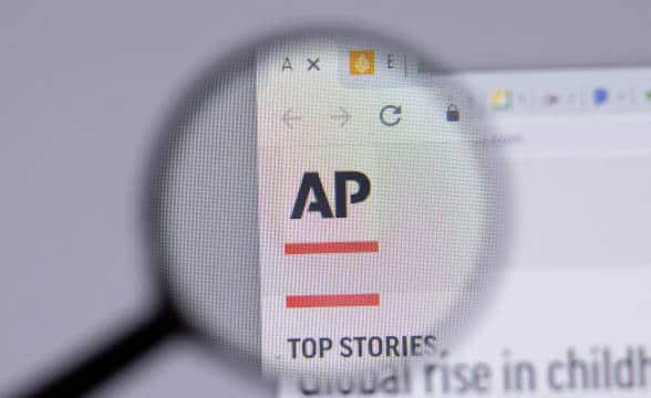 Associated Press' website and logo.