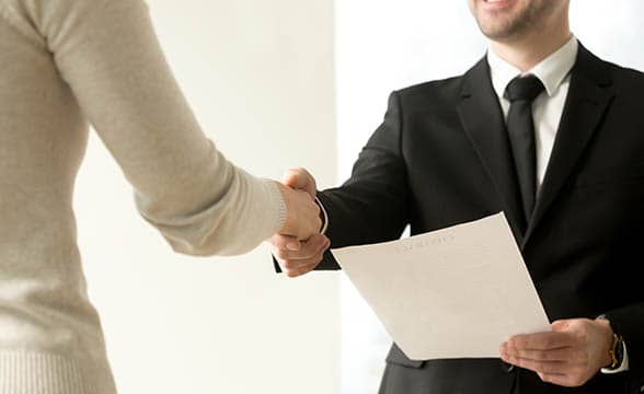 Two businesspeople shake hands