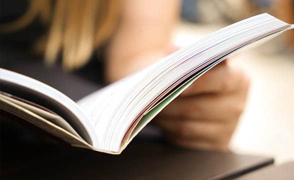 A woman reads a book