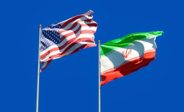 Iran and US' national flags.