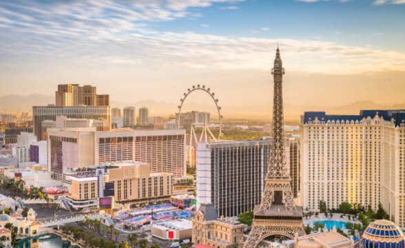 Photo of the Strip in Las Vegas skyline at dusk.