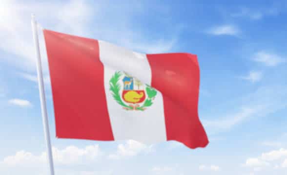 Peru flag on a pole waving in the air