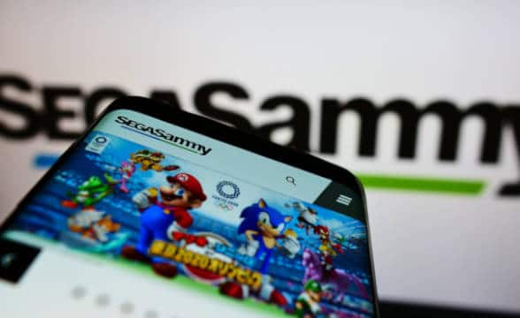 Sega Sammy on mobile phone.