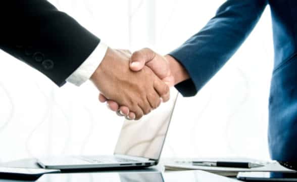 Two businessmen shaking hands