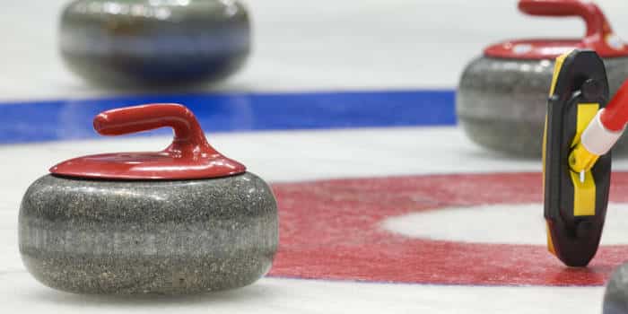 Curling game in progress.